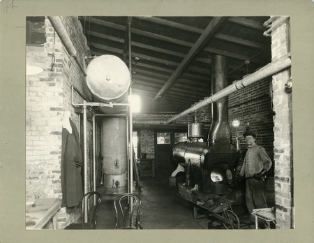 "Quarantine Station, El Paso, Texas. View of boilers in disinfecting plant - one horizontal and one upright, with hot water tank above (left). This is a double plant so that if one unit is closed down for repairs, the work may be continued uninterruptedly."